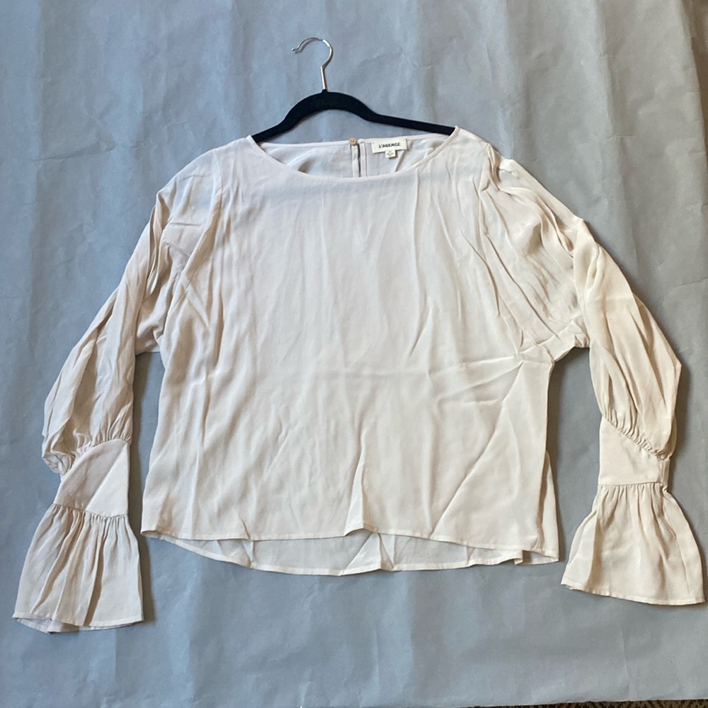 L’Agence silk blouse size small in cream. Slit open long sleeves.